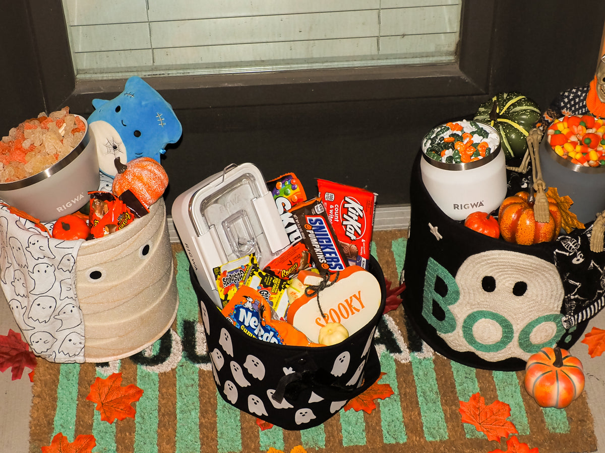 RIGWA insulated cups and bento box filled with Halloween candy in trick-or-treat baskets
